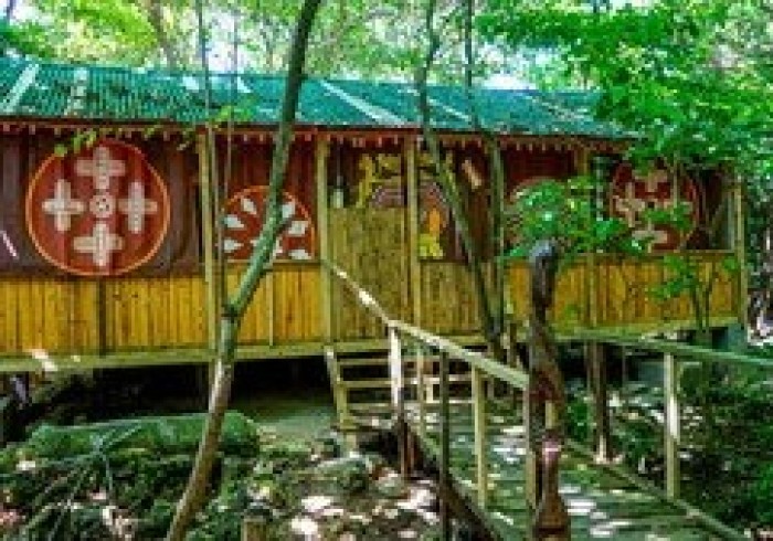 Couple enjoying private picnic on the cliffs at Great Huts romantic wellness escape