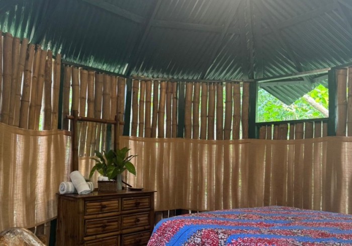 Couple enjoying private picnic on the cliffs at Great Huts romantic wellness escape